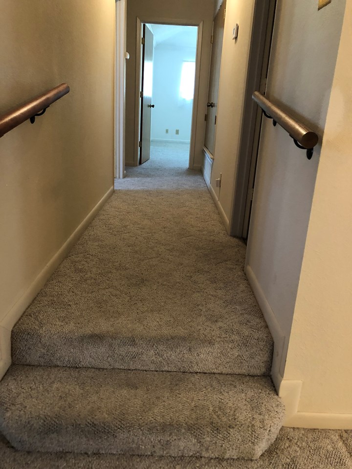 hall to bedrooms  the master bedroom with it’s setting area and private bath, also 2 bedrooms and hall bath are located on the east end of the house.