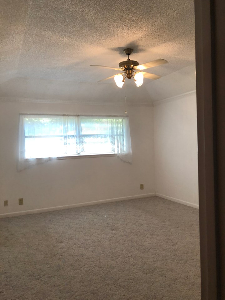 master bedroom .   spacious master bedroom with sitting area